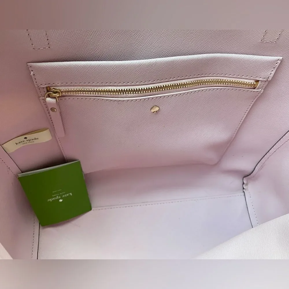 Kate  Spade  Purse with Bow color bag is Black and White